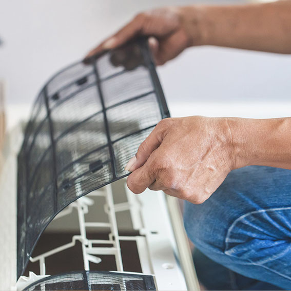 Technician finishing an air conditioning replacement in Perrysburg, OH