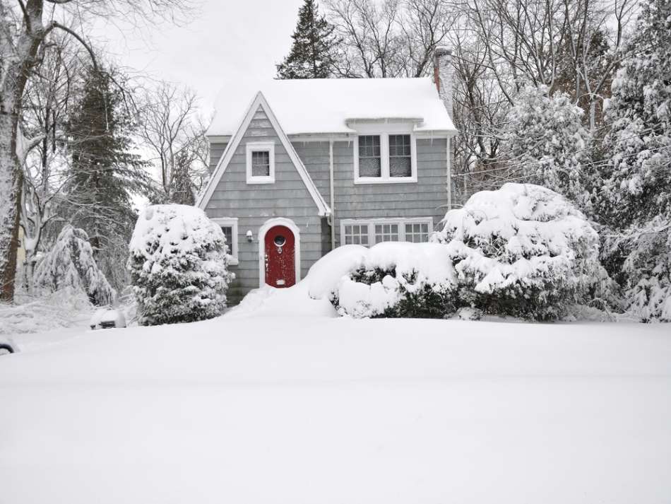 A suburban home in the heavy snow