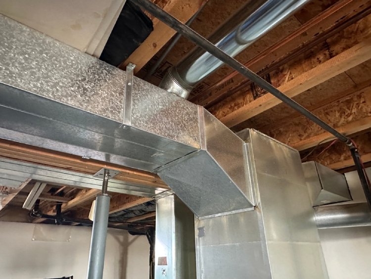 Ductwork over a furnace.